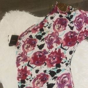Baby phat floral one sleeve dress. Never been worn